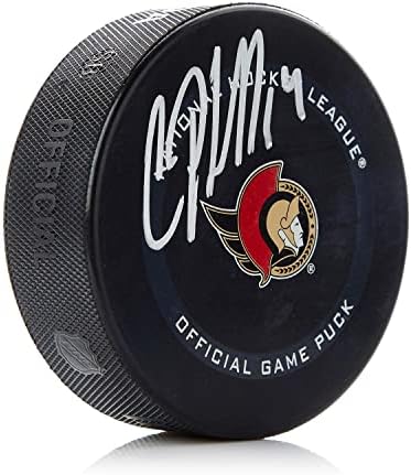 Chris Phillips Ottava Senators potpisao je model igre NHL Paka s autogramima